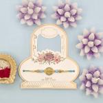 Elegant Beaded Rakhi with Decorative Centerpiece