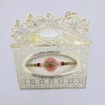 Elegant Beaded Rakhi with Ornamental Centerpiece