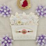 Elegant Beaded Rakhi with Ornamental Centerpiece