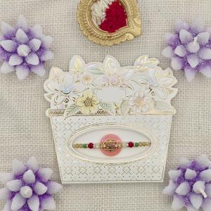 Elegant Beaded Rakhi with Ornamental Centerpiece