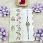 Exquisite Handcrafted Rakhi with Teal & Gold Embellishments