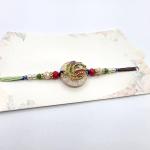 Elegant Peacock Feather Rakhi for Raksha Bandhan