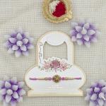 Elegant Ganesha Rakhi with Pink Accents