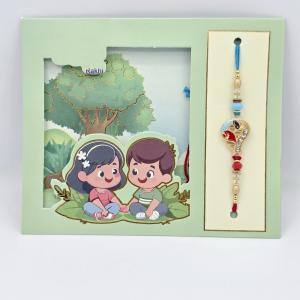 Elegant Peacock Rakhi with Bead Accents