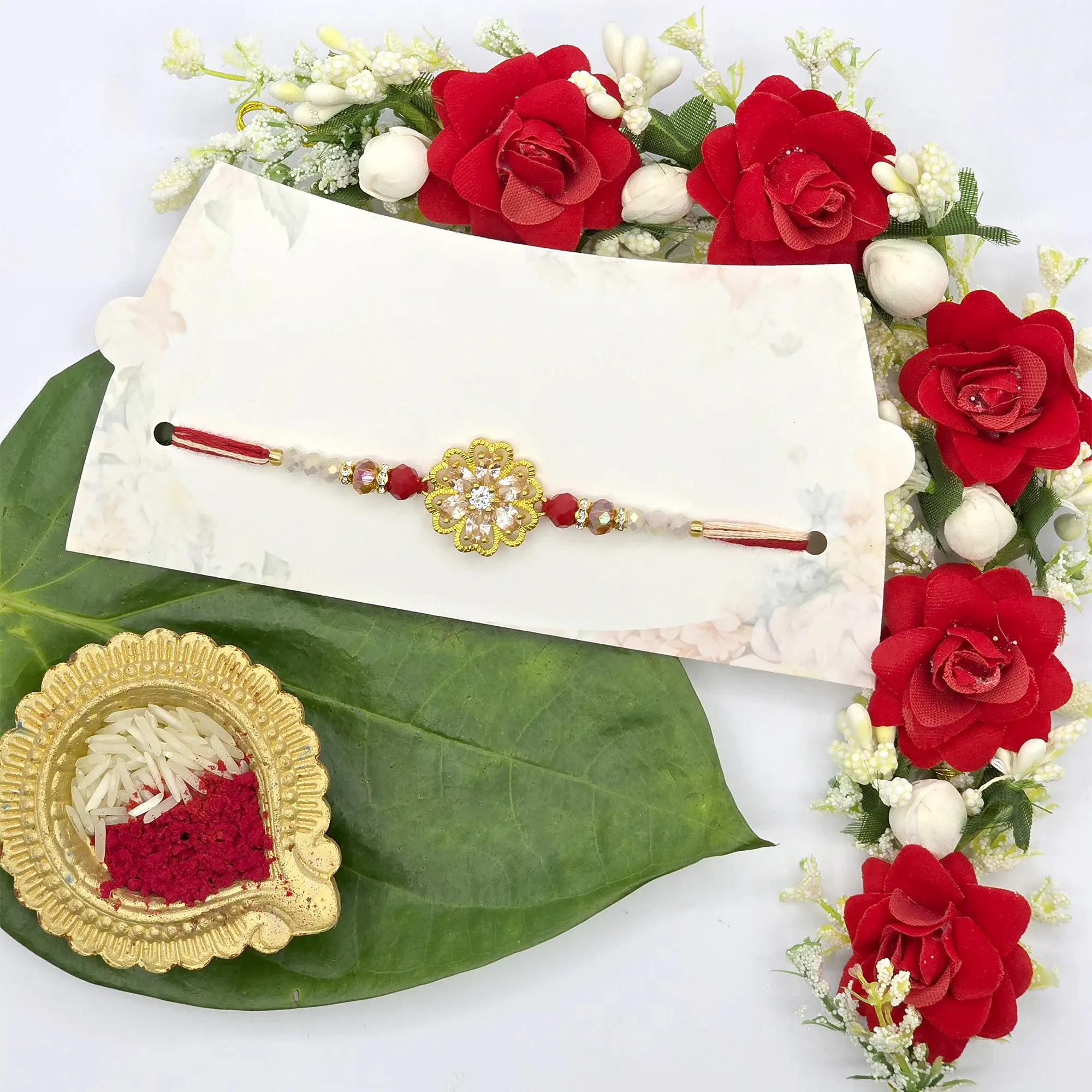 Elegant Rakhi with Floral Centerpiece