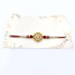 Elegant Rakhi with Floral Centerpiece