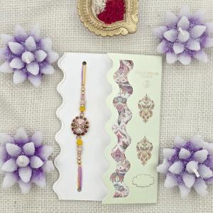 Floral Rakhi with Delicate Bead Accents