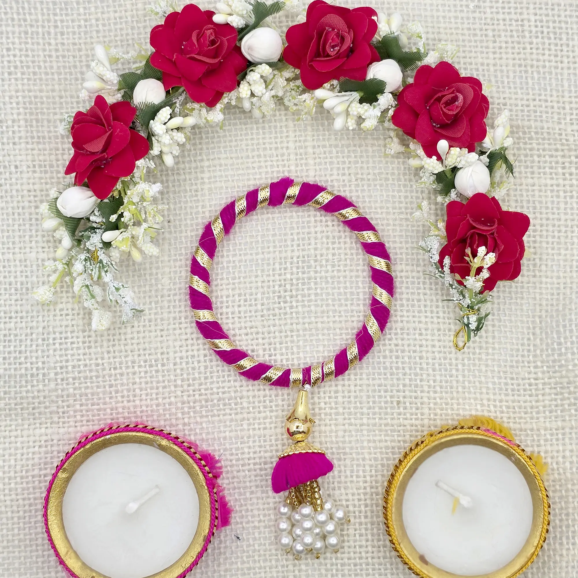 Handcrafted Pink and Gold Rakhi with Pearl Tassel