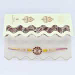 Handcrafted Rakhi with Floral Charm and Decorative Beads