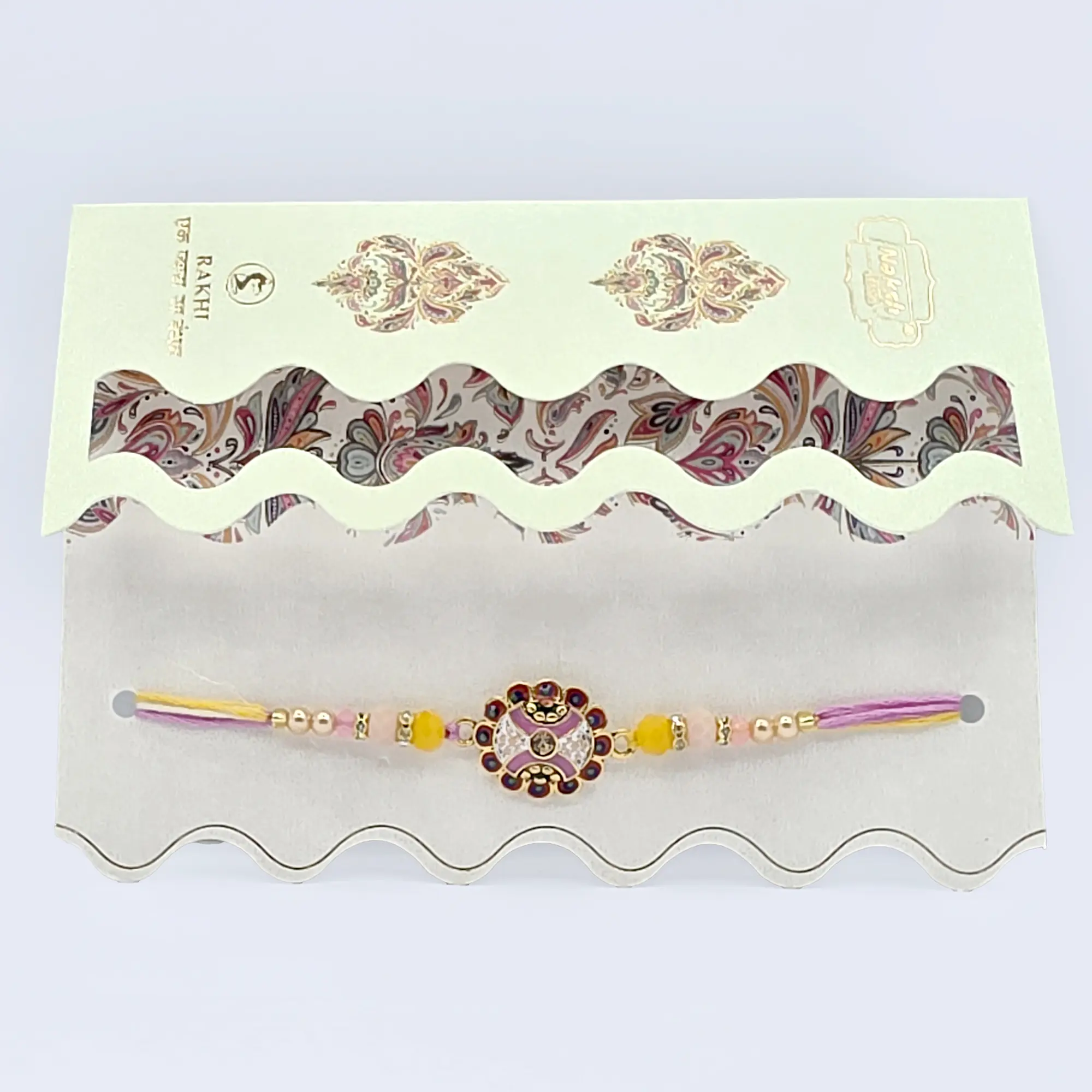 Handcrafted Rakhi with Floral Charm and Decorative Beads