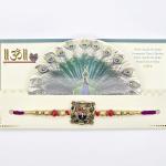 Krishna Rakhi with Gold & Red Beads